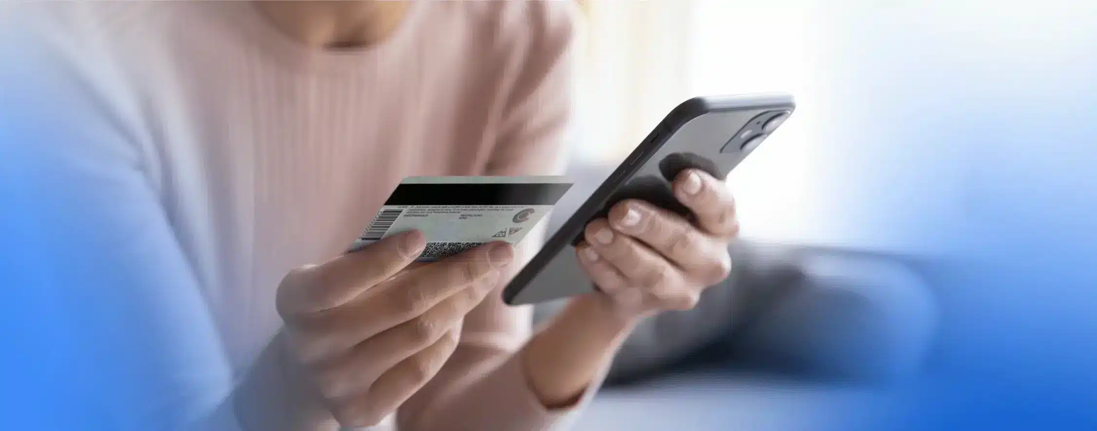 User manually entering card details into the app, showcasing the process of data input for secure transactions